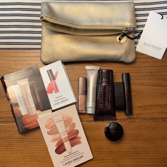 laura mercier Handbags - Laura Mercier gold makeup bag and samples!
